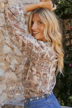 Blouse imprimée et en semi-transparence