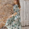 Longue robe portefeuille à volants
