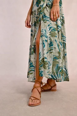 Longue robe portefeuille à volants