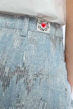 Mini-jupe en jean et sequins