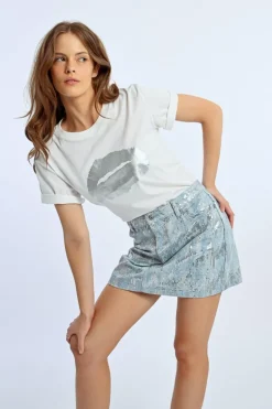 Mini-jupe en jean et sequins