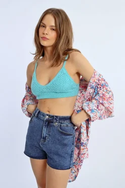 Short en jean à franges