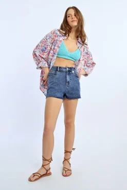 Short en jean à franges