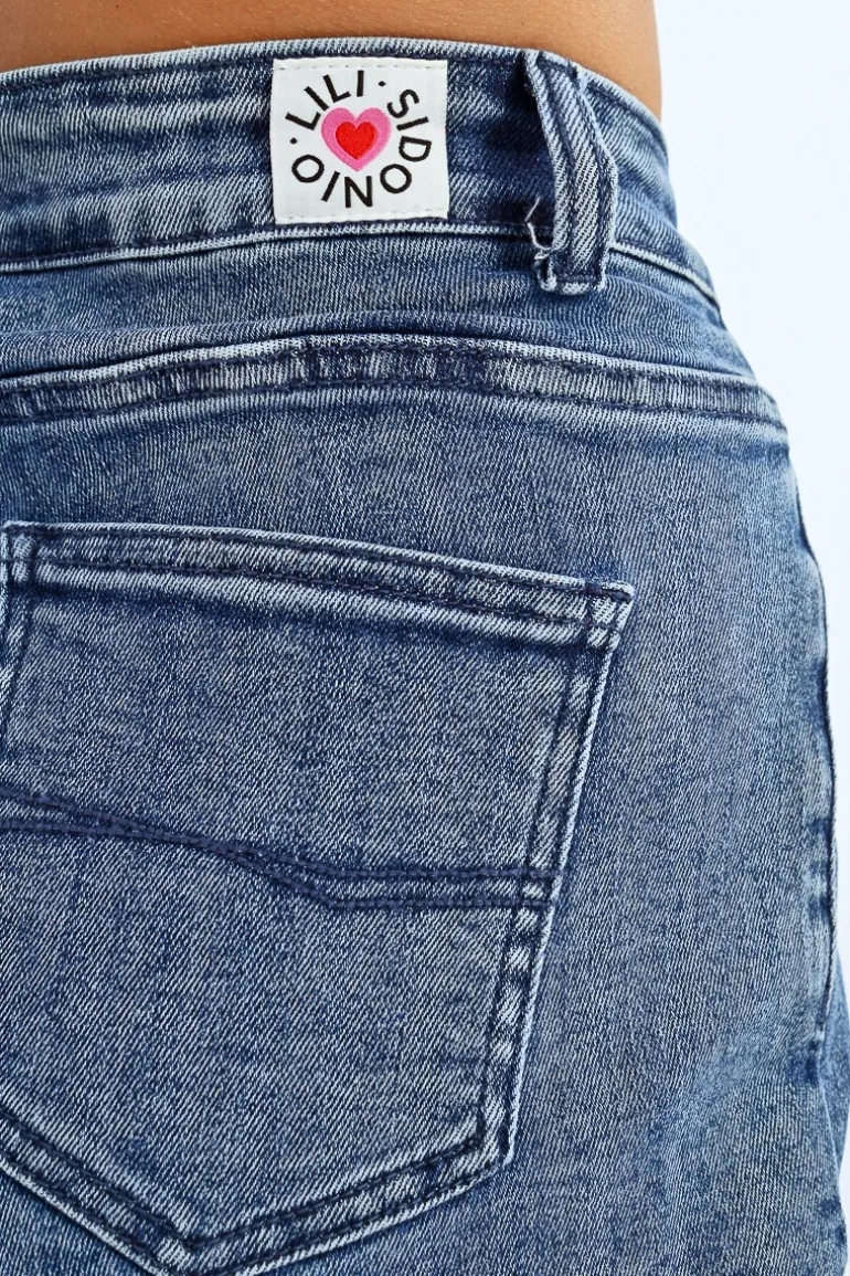 Short en jean à franges