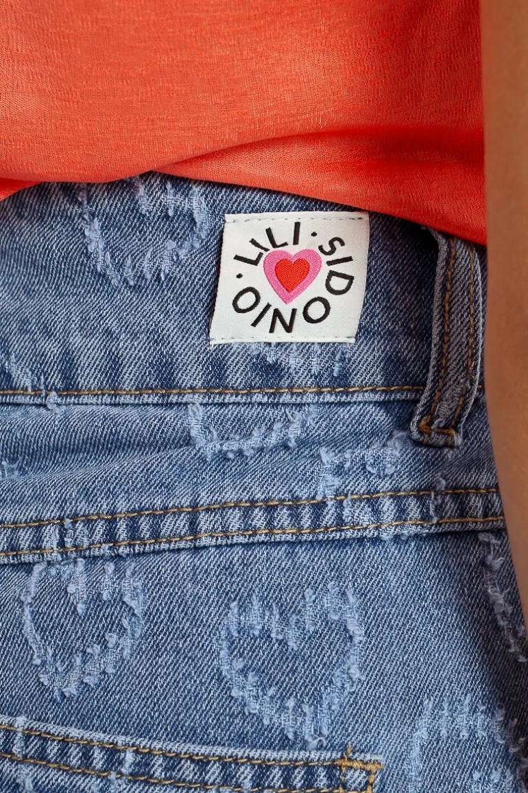 Short en jean à strass